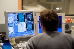 A researcher examines the brain scans at the Waisman Lab for Brain Imaging and Behavior led by Richard J. Davidson.